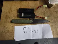 Two 8.4v batteries and rubber training knife