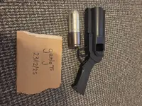 Grenade launcher pistol with grenade